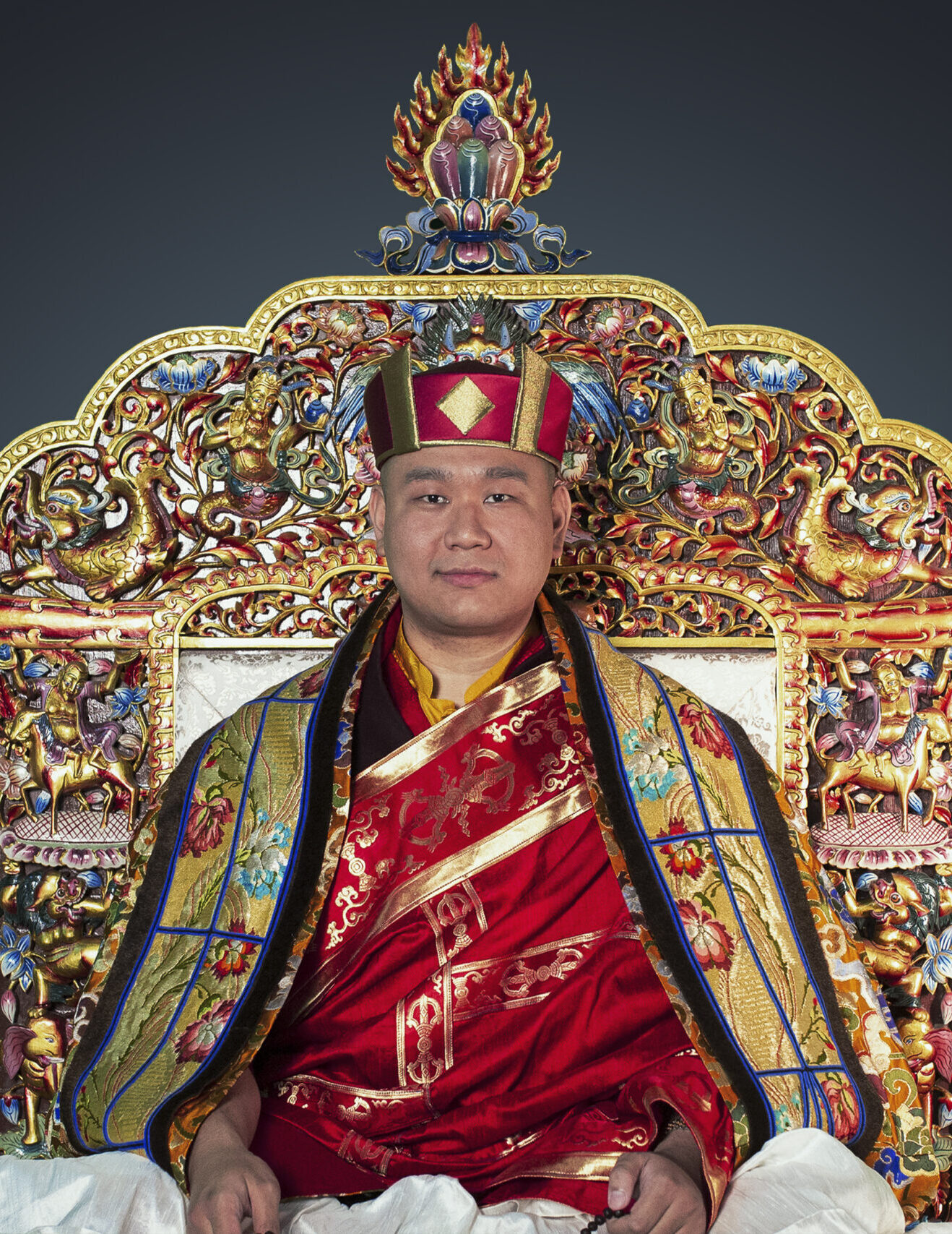 The 4th Jamgon Kongtrul Rinpoche wearing the red crown