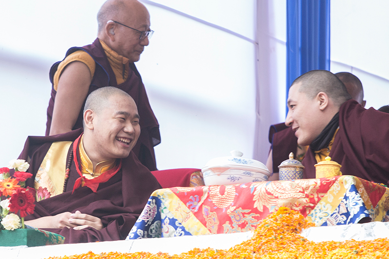 Gyalwa Karmapa Trinley Thaye Dorje speaking with Jamgon Kongtrul Rinpoche during the Lama dance in Bodhgaya, India, at the Karma Temple